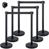 Black retractable belt stanchions with stainless steel construction and heavy-duty base.
