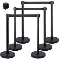 Black retractable belt stanchions with stainless steel construction and heavy-duty base.