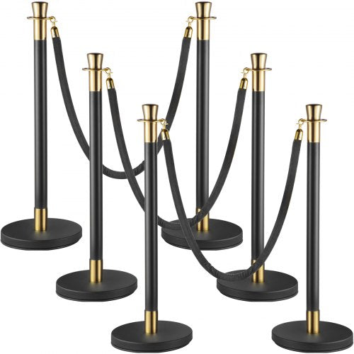 Black velvet rope stanchion set with six stainless steel poles for crowd control.