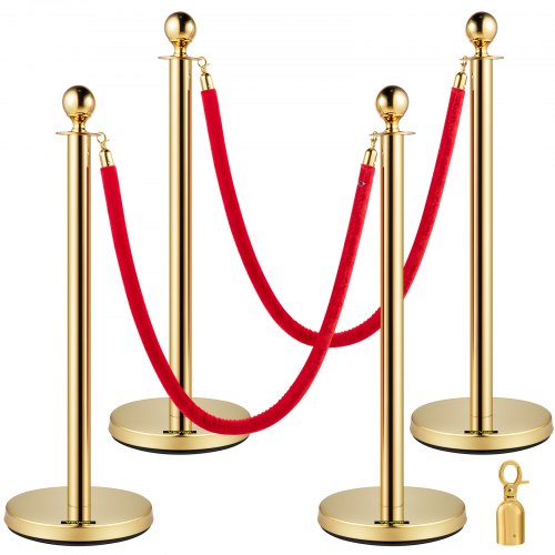 Four gold stainless steel stanchions with red velvet ropes for crowd control.