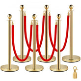 Gold stanchion post with red rope, 37.4 inches tall, sturdy base for crowd control.