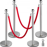 Four silver stainless steel stanchions with red velvet ropes and weighted bases.
