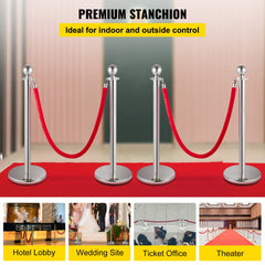 Four silver stainless steel stanchions with red velvet ropes and weighted bases for crowd control.