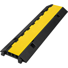 A black and yellow 3-channel rubber cable protector ramp is angled on a white background.