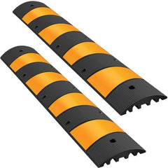 Two 6ft heavy-duty rubber speed bumps with yellow stripes and cable channels.