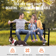 A 50-inch metal outdoor garden bench with backrest, seating a family of three and a dog in a grassy park.