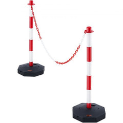 Two red and white adjustable traffic delineator posts with chain, on black bases.