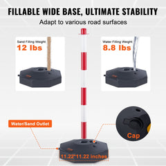 Two red and white adjustable traffic delineator posts with fillable black bases for sand or water.