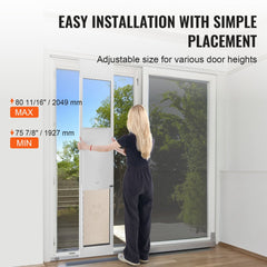 A woman installs an adjustable XL dog door panel in a sliding glass door, sized 75 7/8 to 80 11/16 inches high.