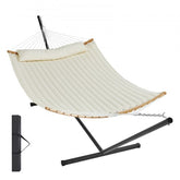 Bostome double quilted hammock with stand, spacious for two, featuring hardwood spreader bars.