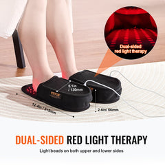 Black Bostome slippers with dual-sided red light therapy LEDs on upper and lower surfaces for foot treatment.