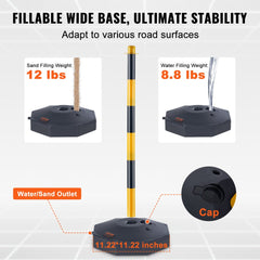 Two yellow and black adjustable traffic delineator posts with fillable black bases for sand or water stability.