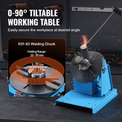 Blue rotary welding positioner with 0-90° tiltable table and 8.1-inch 3-jaw chuck for 10KG load.