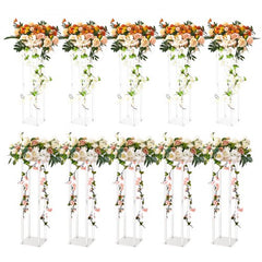 Ten 23.6-inch acrylic geometric flower stands with orange and white floral arrangements.