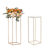 Two 31.5-inch gold iron wedding flower stands with acrylic laminate tops and open cube design.