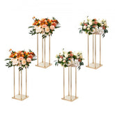 Four gold metal column flower stands, each 23.6 inches high, designed for wedding decor.