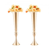 Gold metal trumpet flower vases, 22 inches tall, with a sleek design for elegant displays.