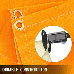 Orange fiberglass welding blanket with grommets, designed for fire retardant protection.