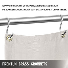 White fiberglass welding blanket with brass grommets, fire retardant and durable construction.