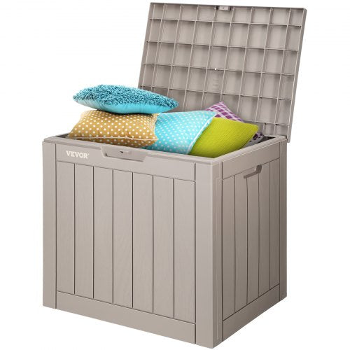 Gray waterproof outdoor deck box with wood-grain finish and colorful pillows inside, lid open.