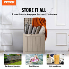 Gray 31-gallon waterproof outdoor deck box with wood-grain finish, open lid showing storage for pillows and blankets.