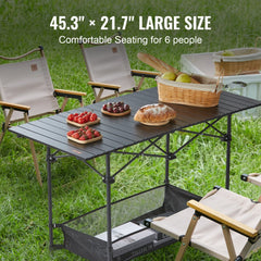 Large aluminum folding camping table with chairs on grass, sized 45.3x21.7 inches for six people.