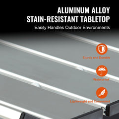 Silver aluminum folding camping table with a waterproof, stain-resistant surface and carry bag.