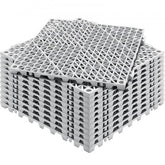 Stack of 12 gray PVC interlocking drainage floor mats, 12x12 inches each.