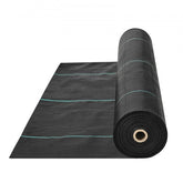 Rolled black woven geotextile weed barrier fabric with green guide lines, 13x60 feet.