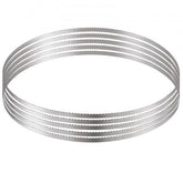 Five 51.2" carbon steel meat bone band saw blades in rust-proof wrapping for easy storage.