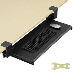 Pull-out keyboard tray with C-clamp mount under a wooden desk, holding a keyboard and mouse.