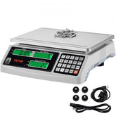 Silver Bostome industrial counting scale with 15kg x 0.5g display, RS232 port, keypad, and accessories.
