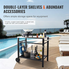 Stainless steel outdoor grill cart with double-layered shelves and various storage accessories.
