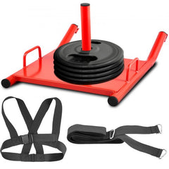 Red power speed training sled with 500 lbs capacity, black harness, and weight plates.