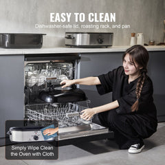 Silver Bostome 18 QT Electric Roaster Oven with self-basting lid and glass window.