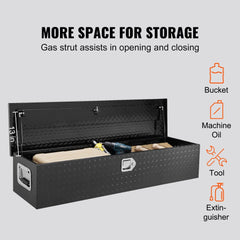 Black 48x15x15 aluminum truck bed tool box with open lid, gas strut, and stored tools.