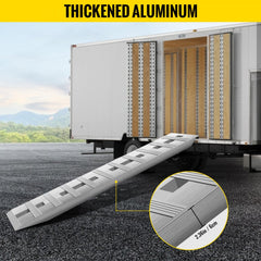 Pair of 60x12x2.5-inch aluminum trailer ramps with 6000 lbs capacity, shown attached to a white trailer.