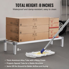 Aluminum dunnage rack, 48x14x8 inches, elevated on legs with boxes and mop nearby.