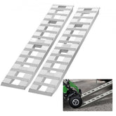Pair of 72-inch by 15-inch aluminum loading ramps with 6000 lbs capacity, shown loading a green go-kart.