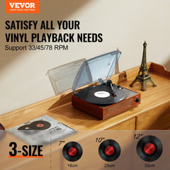 Wooden belt-driven vinyl record player with transparent dust cover and Eiffel Tower decor on table.