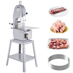 A gray meat bandsaw with a stand, accompanied by various cuts of meat and extra blades.