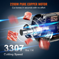 Vertical stainless steel meat bandsaw with 2200W motor and 24.4x20.5in table, cutting bones.