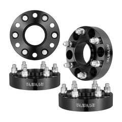Four black forged aluminum wheel spacers, 1.5-inch thick, 6x5-inch bolt pattern, 6-lug, in a 4-pack.