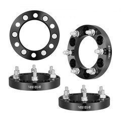 Four black forged aluminum 1-inch wheel spacers with 6x5.5-inch 6-lug pattern.