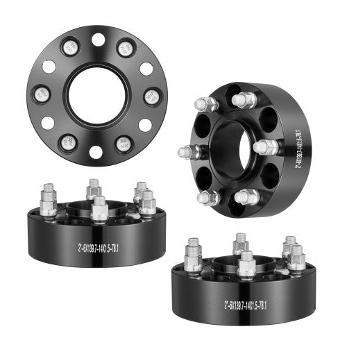Black 2-inch forged wheel spacers with 6x5.5 bolt pattern for trucks, set of four.