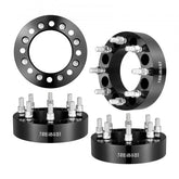 Black forged aluminum wheel spacers, 2-inch thickness, 8-lug, designed for Dodge and Ford trucks.