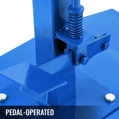 Blue pedal-operated tire spreader stand with adjustable LED light.