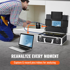 Man kneeling with 100ft sewer inspection camera connected to 7-inch monitor and laptop.