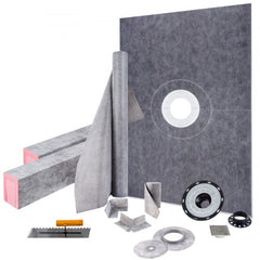 A shower curb kit with a gray waterproof membrane, drain, and installation tools.