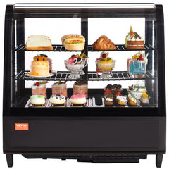 A black countertop refrigerated display case with two tiers of various desserts.